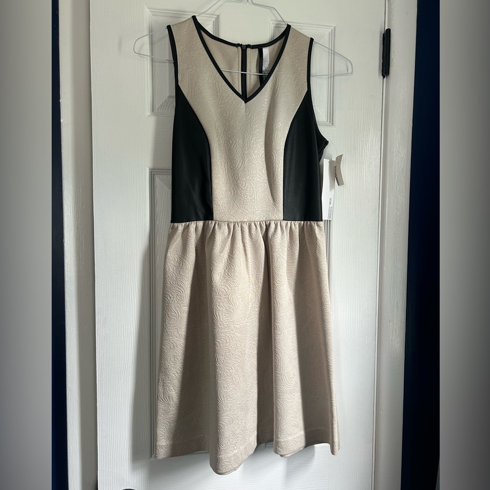 Sleeveless leather/embossed skater dress